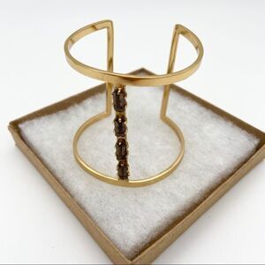 Elegant jeweled gold tone cuff cage bracelet